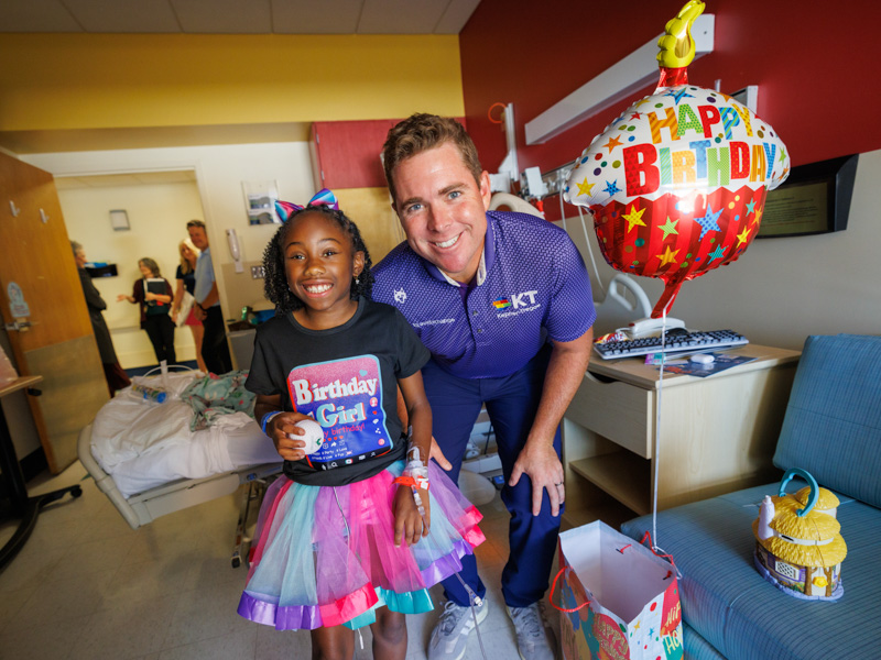 Children's of Mississippi patient Gabriella Miller of Clinton got a visit from 2023 Sanderson Farms Championship winner Luke List on her eighth birthday.